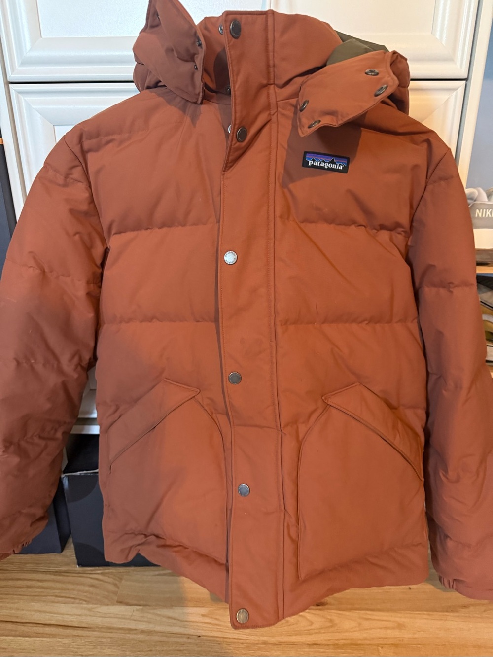 Patagonia Men’s Rust Orange Hooded Down Jacket